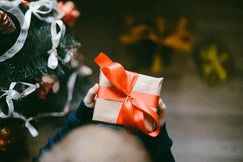 Gift with red ribbon.